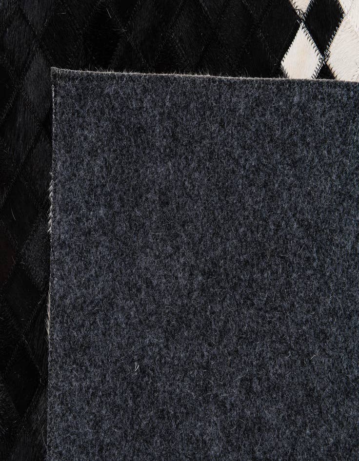 Detail image of 8' 1 x 9' 11 Cowhide Stocks Rug