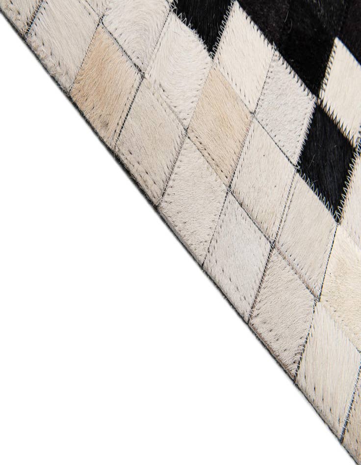 Detail image of 8' 1 x 10' 1 Cowhide Stocks Rug