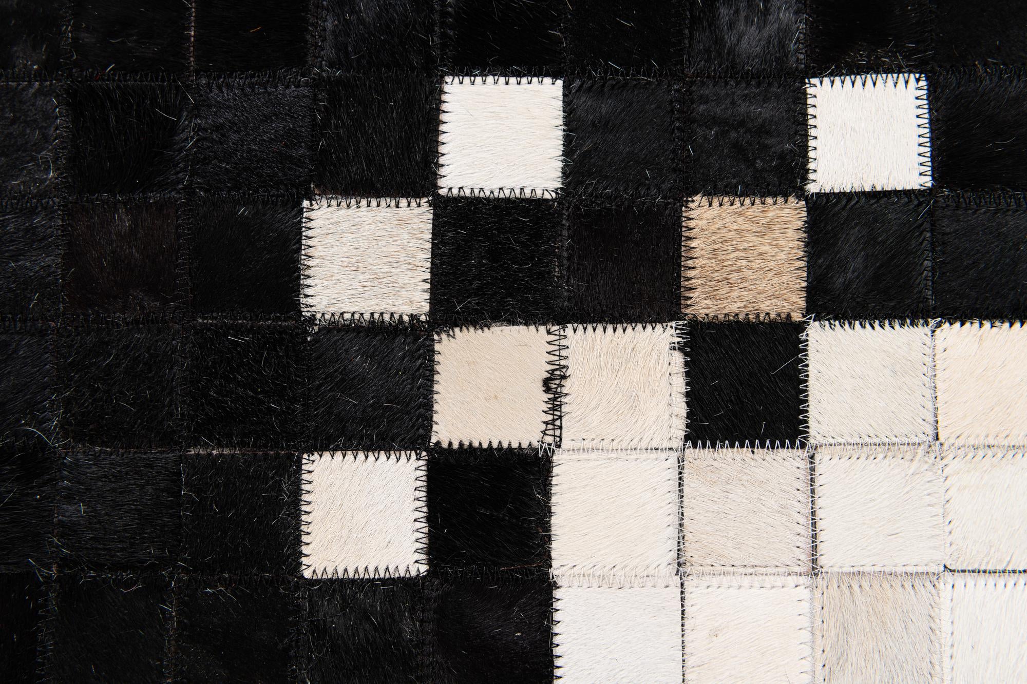 8' 1 x 10' 1 Cowhide Stocks Rug