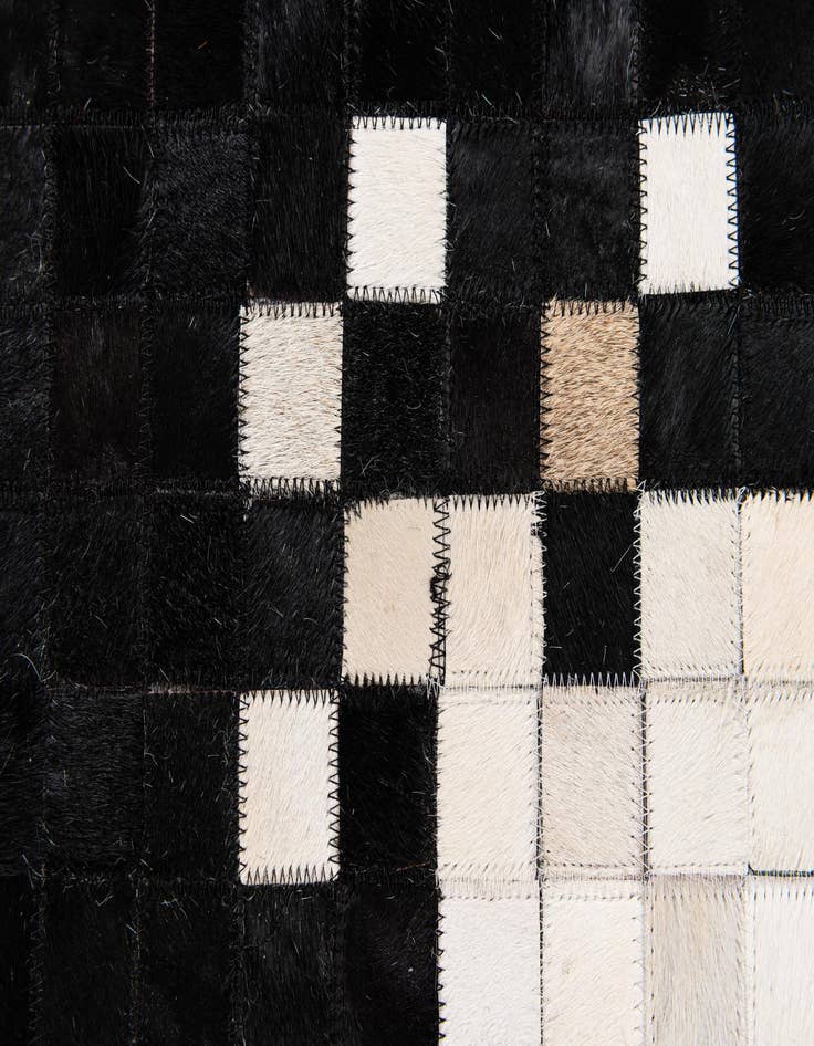 Detail image of 8' 1 x 10' 1 Cowhide Stocks Rug