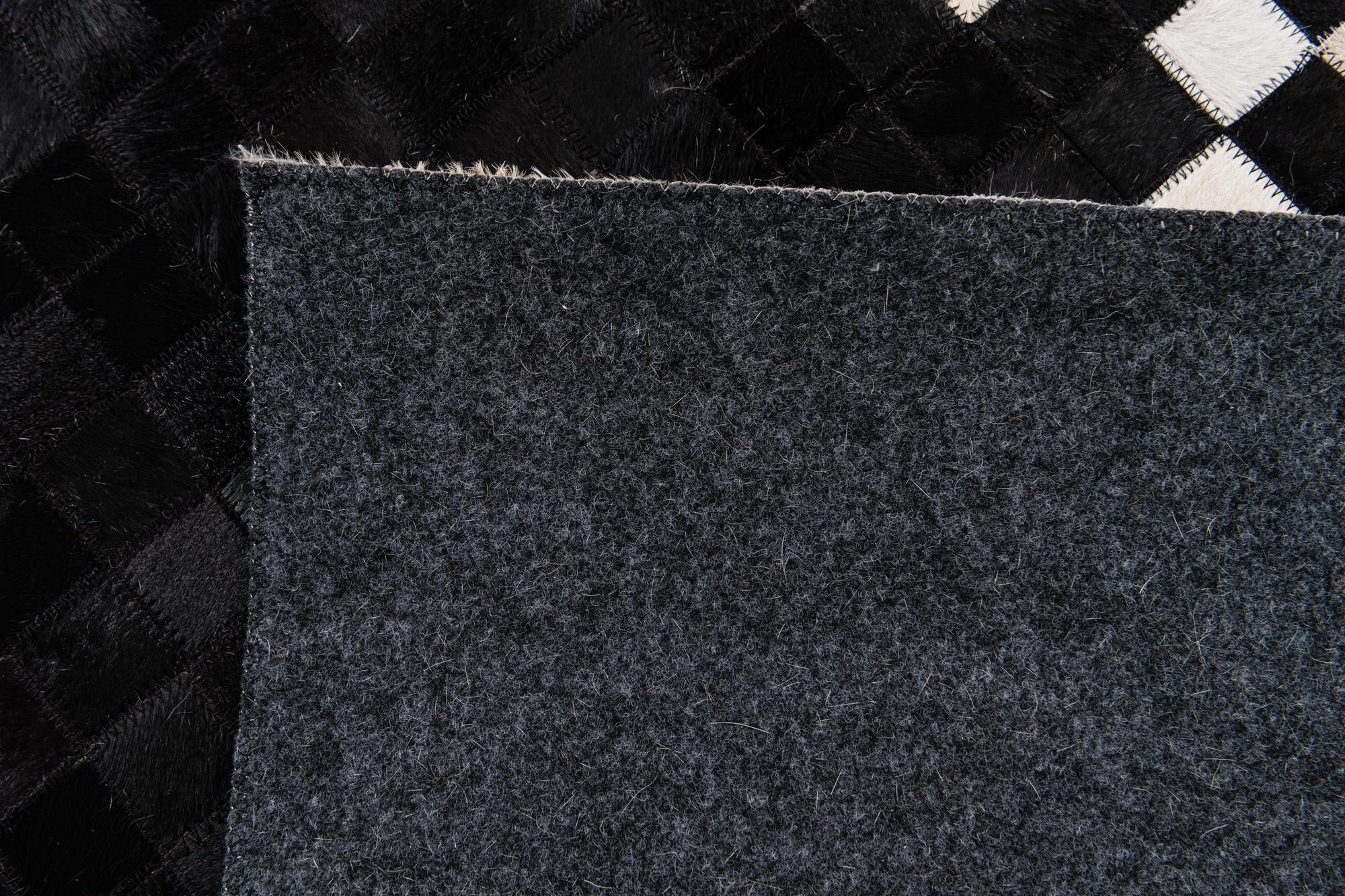 8' 1 x 10' 1 Cowhide Stocks Rug