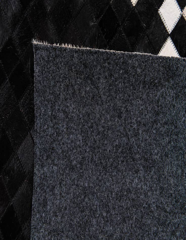 Detail image of 8' 1 x 10' 1 Cowhide Stocks Rug