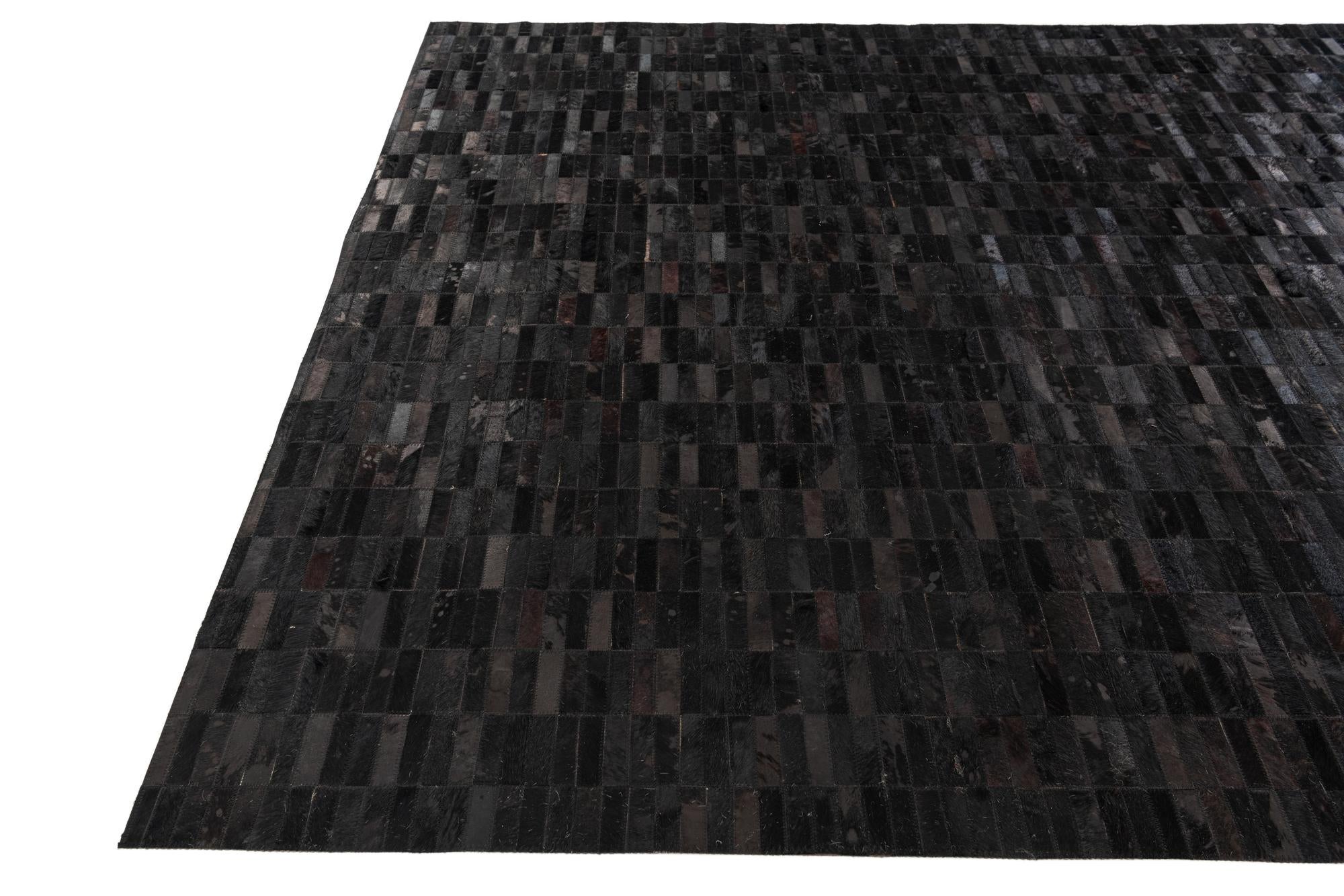 5' 11 x 9' Cowhide Stocks Rug