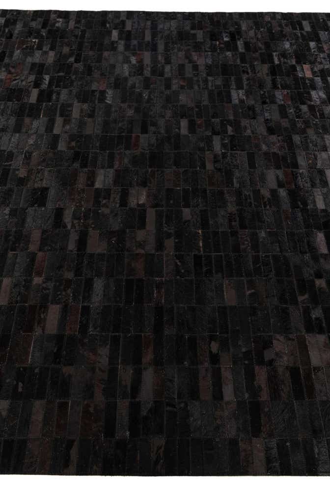 5' 11 x 9' Cowhide Stocks Rug
