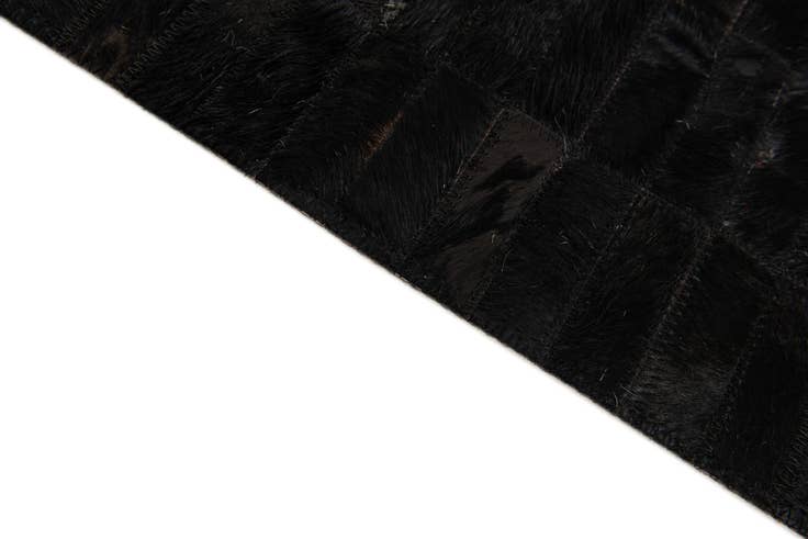 Detail image of 5' 11 x 9' Cowhide Stocks Rug