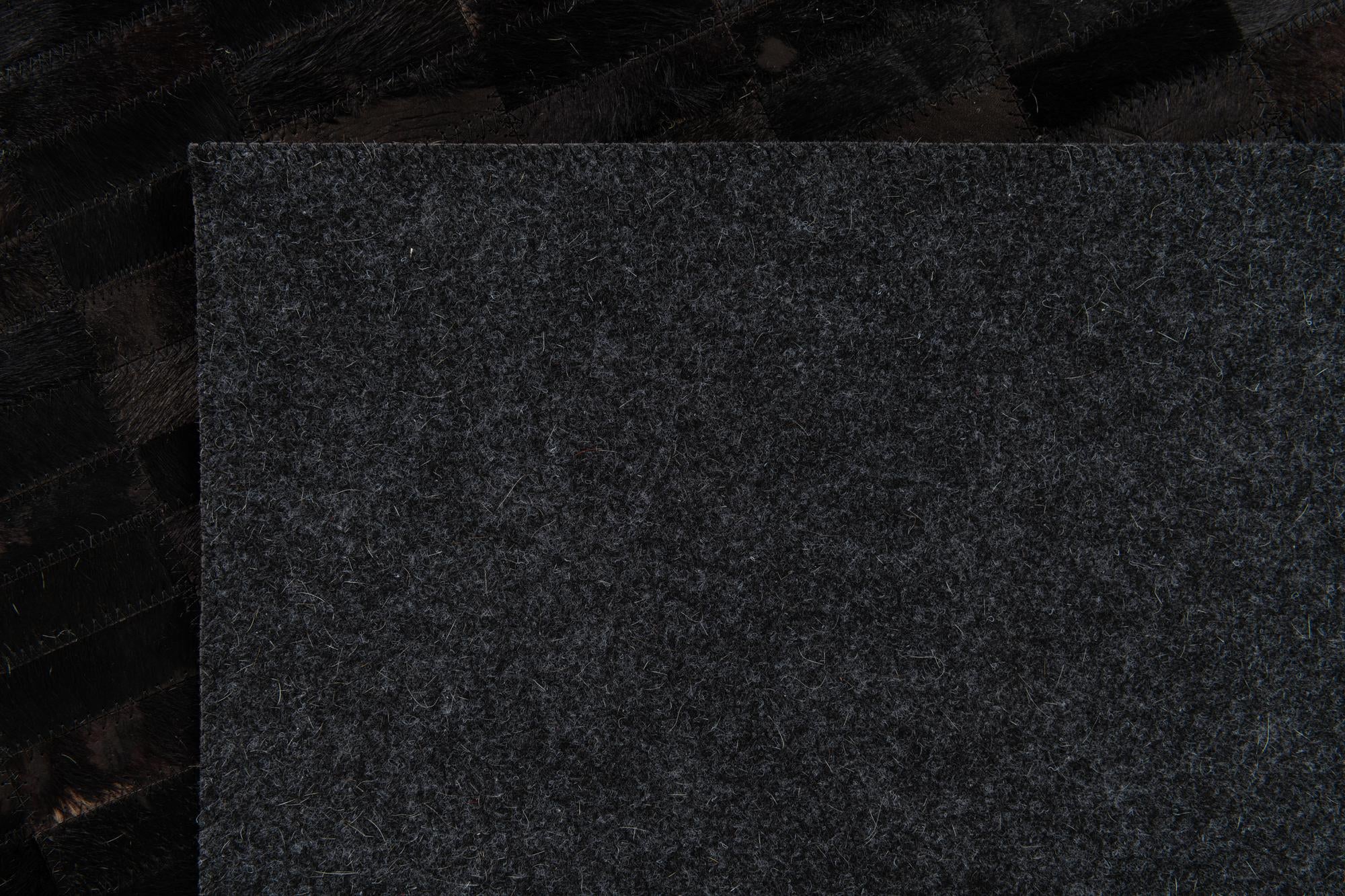 5' 11 x 9' Cowhide Stocks Rug