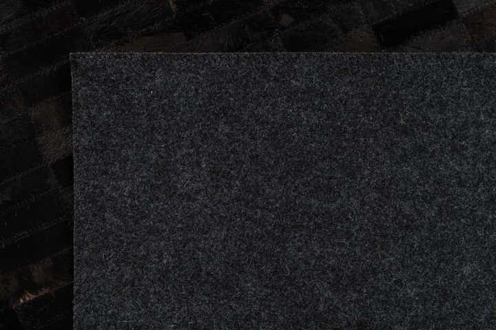 5' 11 x 9' Cowhide Stocks Rug