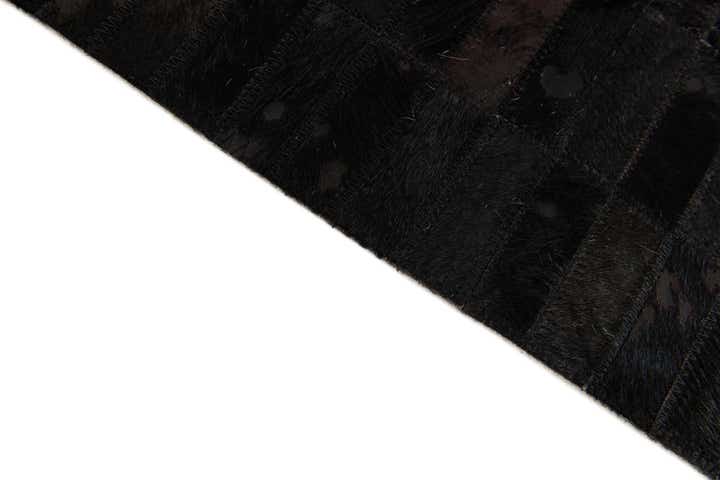 5' 11 x 9' Cowhide Stocks Rug