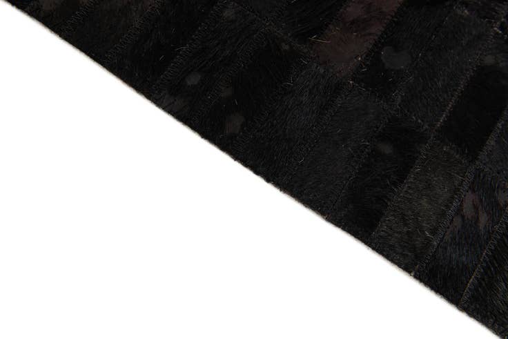 Detail image of 5' 11 x 9' Cowhide Stocks Rug