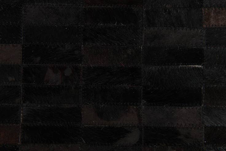 Detail image of 5' 11 x 9' Cowhide Stocks Rug