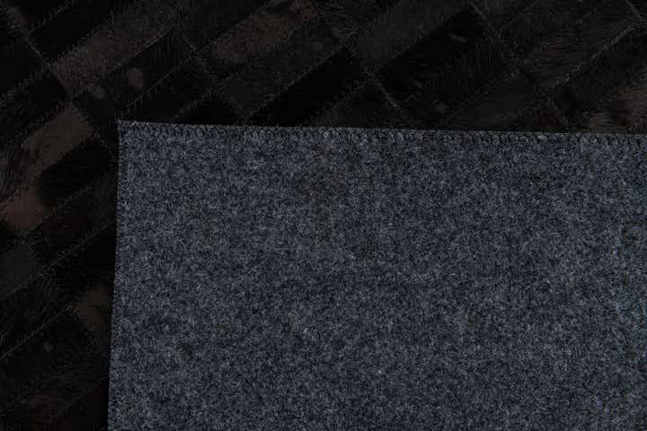 5' 11 x 9' Cowhide Stocks Rug