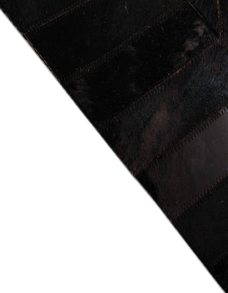 Detail image of 6' x 8' 11 Cowhide Stocks Rug