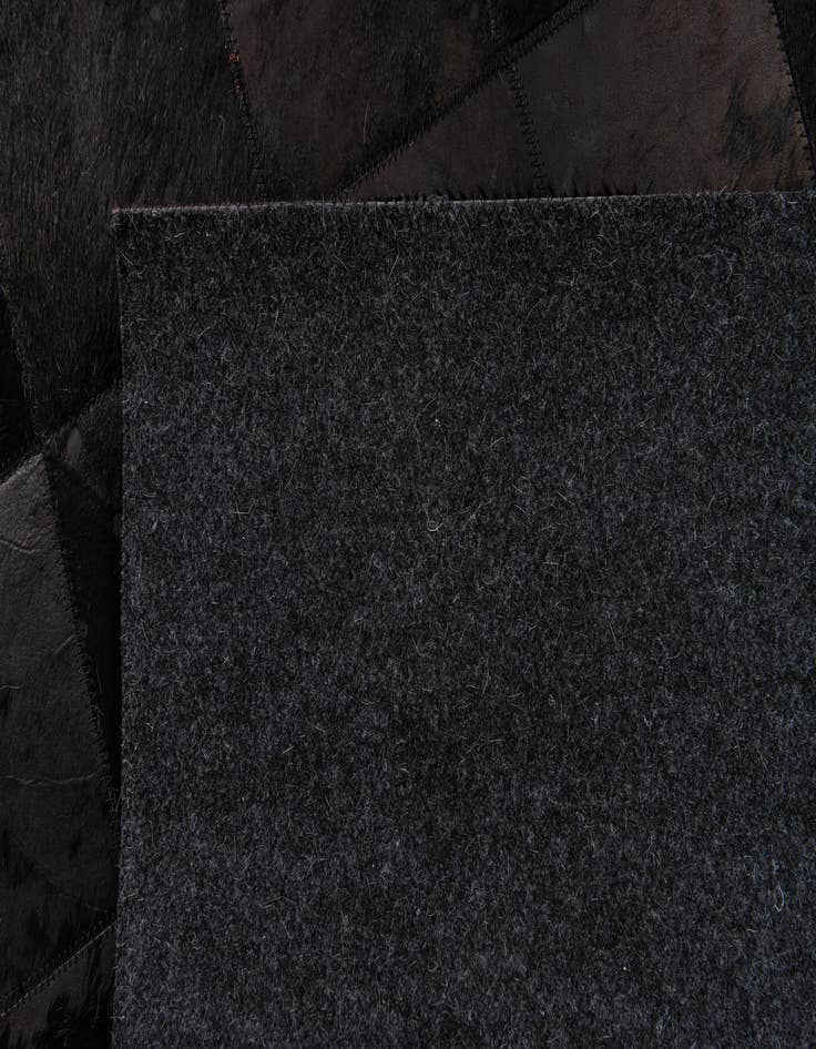 Detail image of 6' x 8' 11 Cowhide Stocks Rug