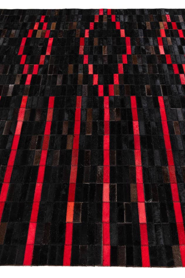 Detail image of 5' x 7' 11 Cowhide Stocks Rug