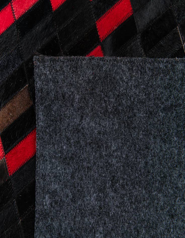 Detail image of 5' x 7' 11 Cowhide Stocks Rug