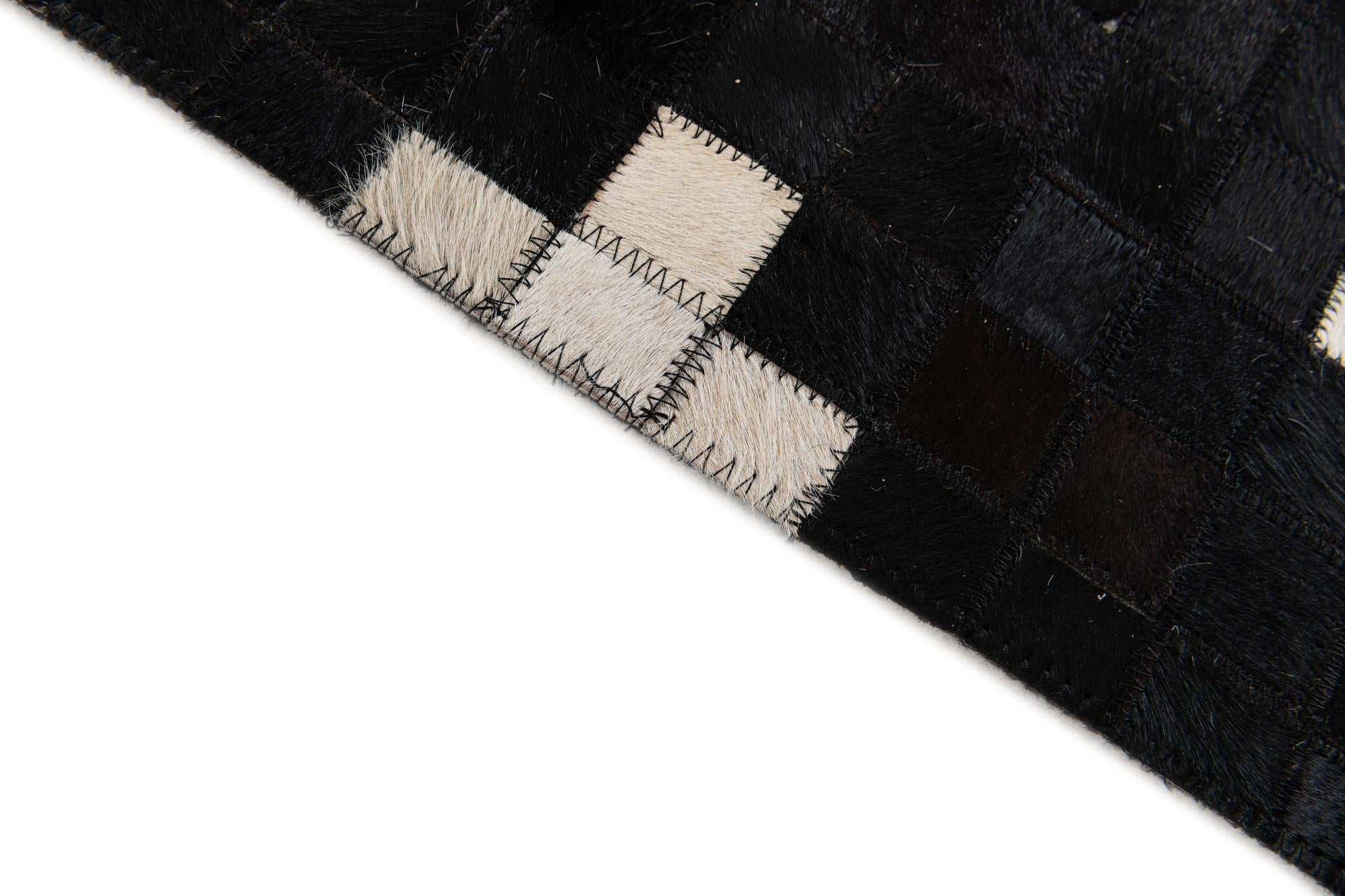 5' 2 x 7' 11 Cowhide Stocks Rug