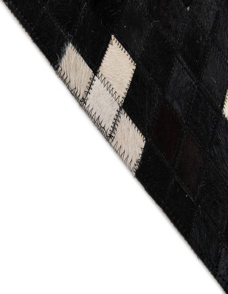 Detail image of 5' 2 x 7' 11 Cowhide Stocks Rug