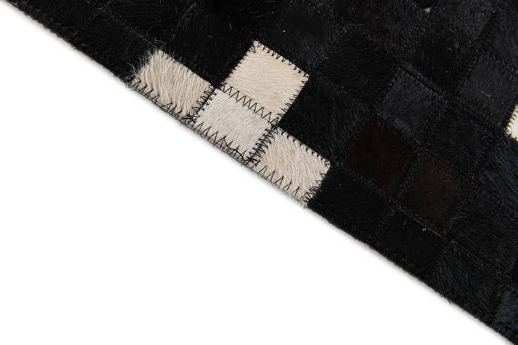 Detail image of 5' 2 x 7' 11 Cowhide Stocks Rug