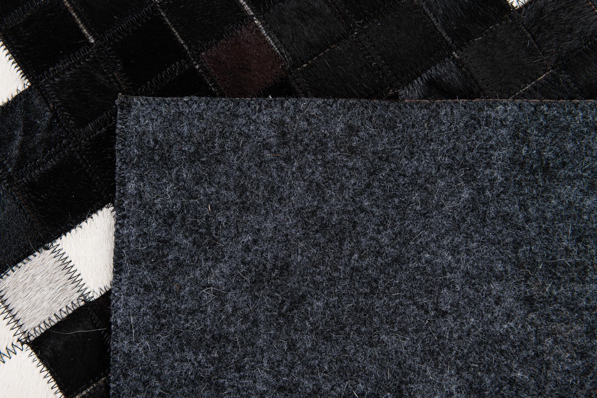 5' 2 x 7' 11 Cowhide Stocks Rug