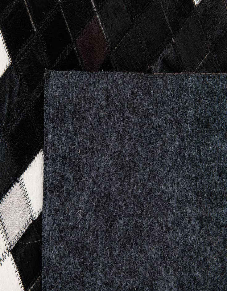 Detail image of 5' 2 x 7' 11 Cowhide Stocks Rug