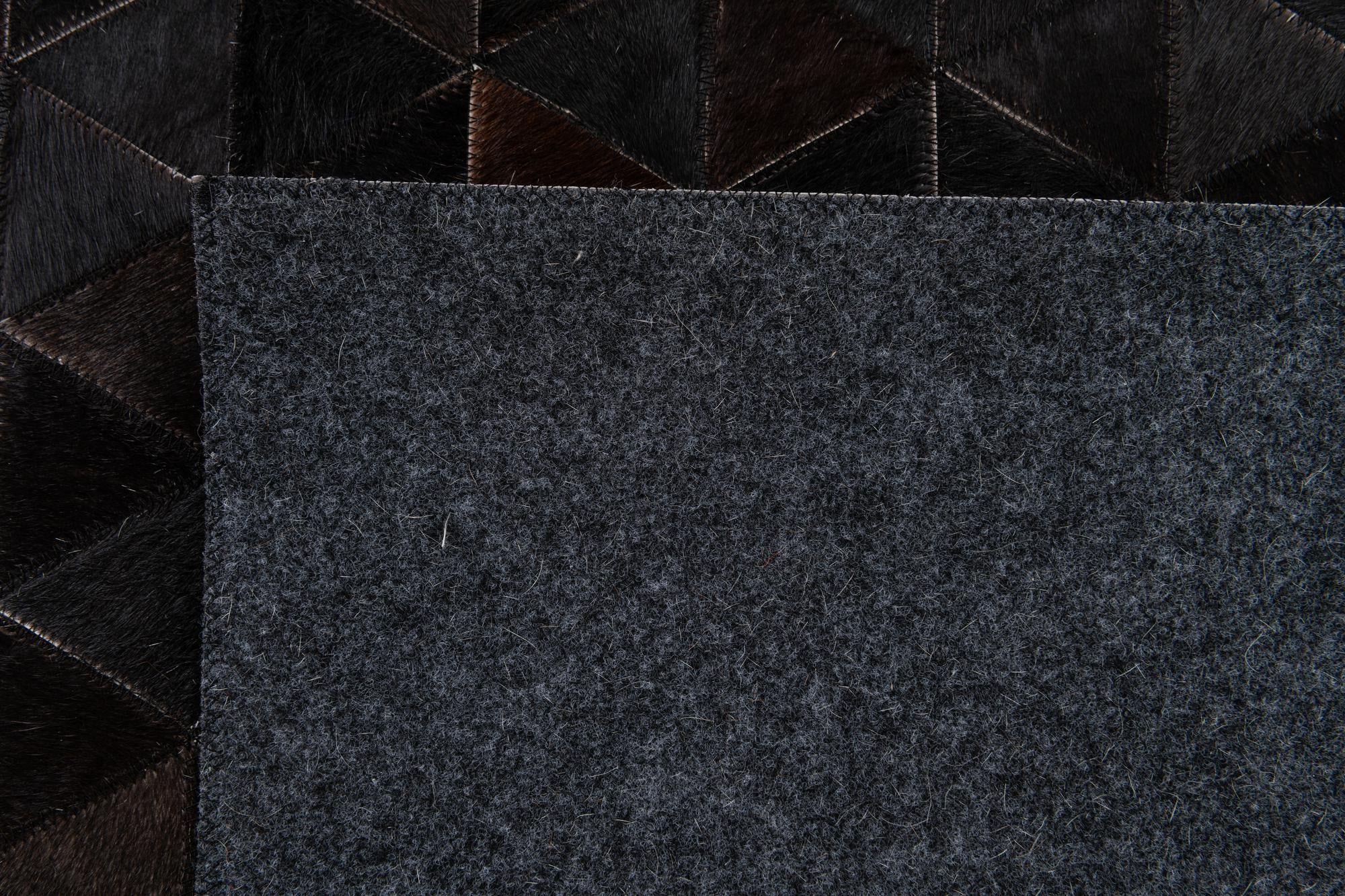 5' 1 x 7' 10 Cowhide Stocks Rug