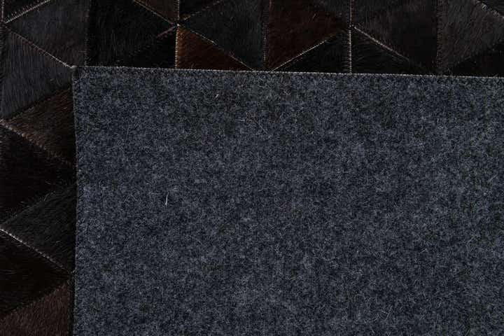 5' 1 x 7' 10 Cowhide Stocks Rug