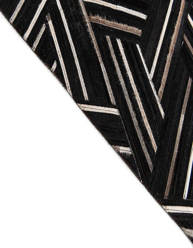 Detail image of 5' 1 x 7' 11 Cowhide Stocks Rug