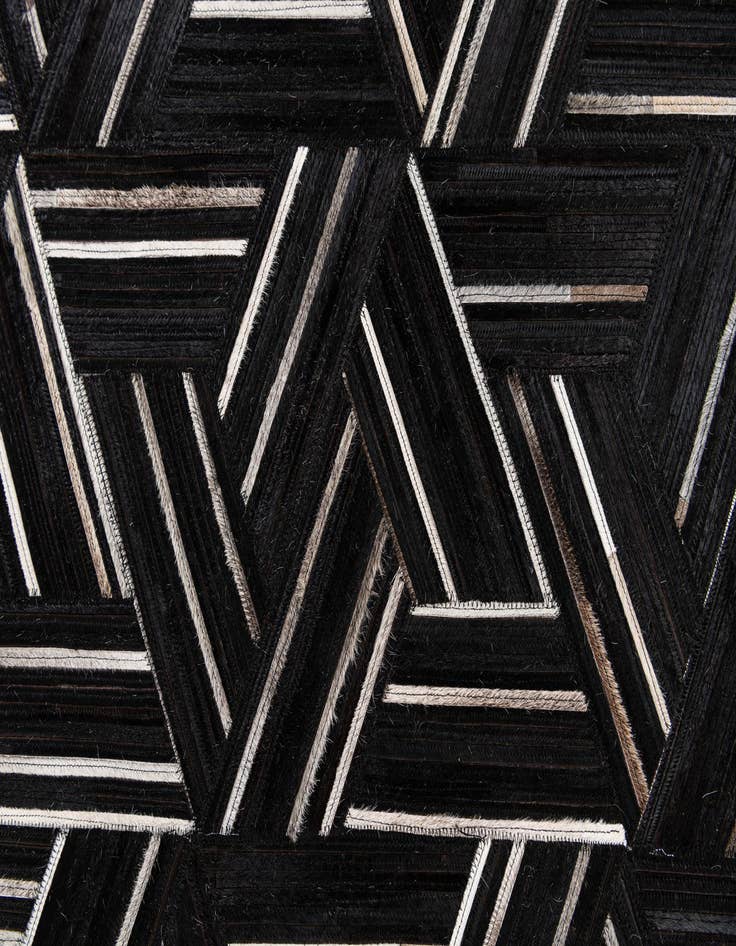 Detail image of 5' 1 x 7' 11 Cowhide Stocks Rug