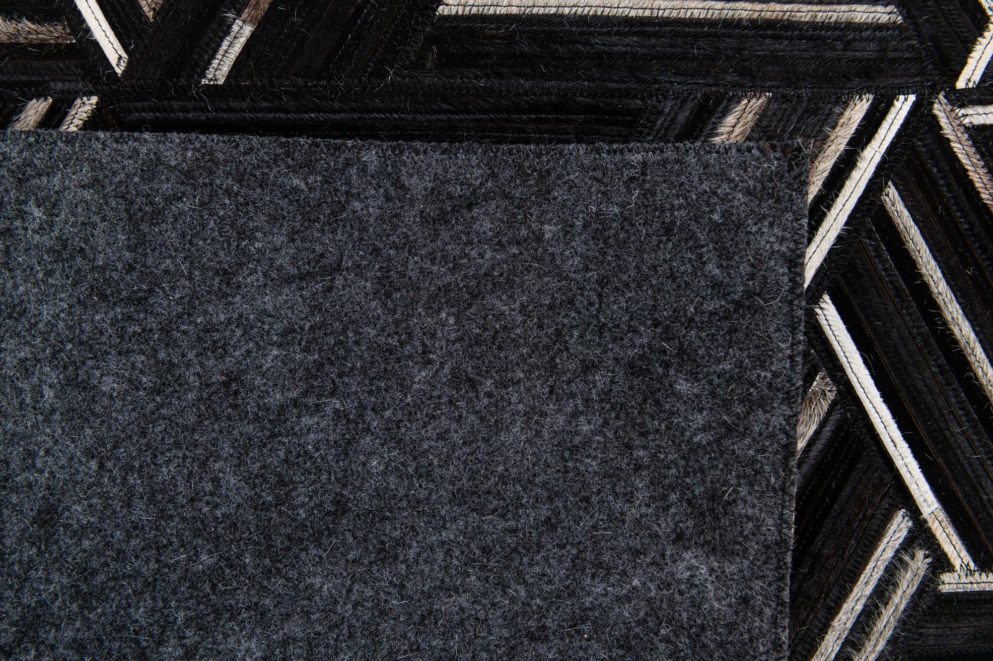 5' 1 x 7' 11 Cowhide Stocks Rug
