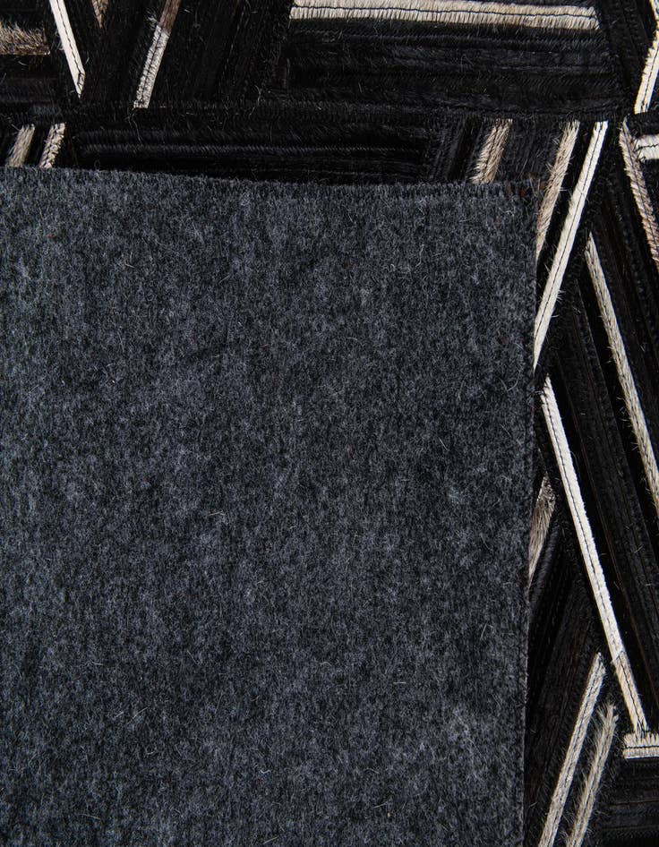 Detail image of 5' 1 x 7' 11 Cowhide Stocks Rug