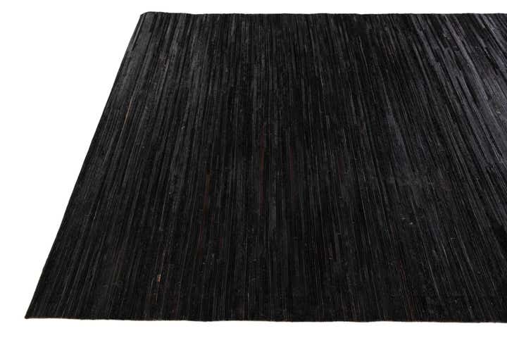 5' x 8' Cowhide Stocks Rug