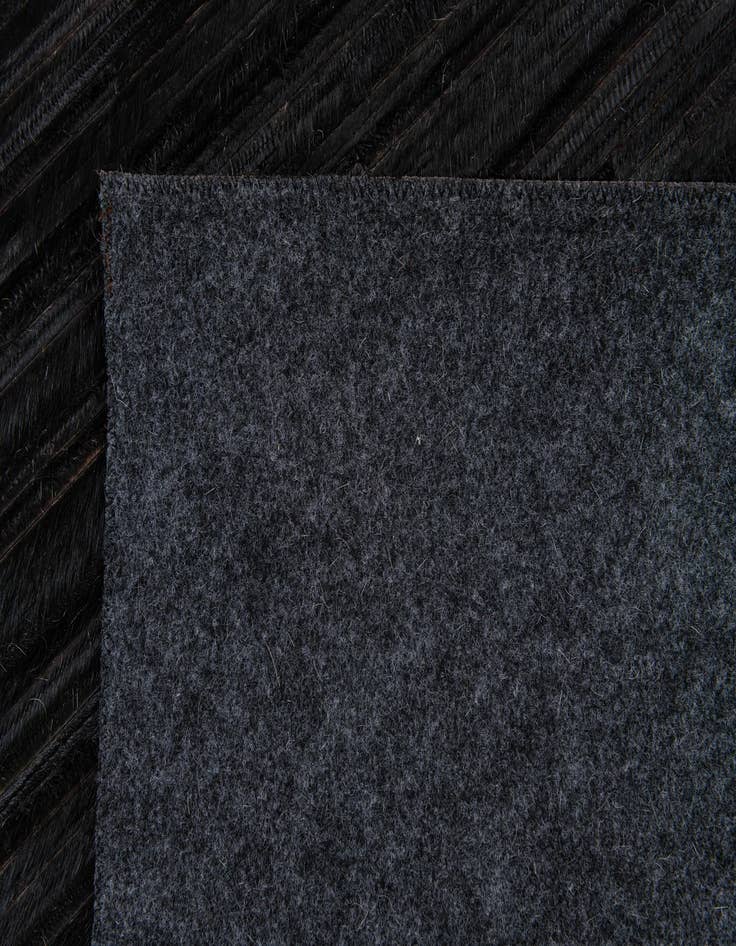 Detail image of 5' x 8' Cowhide Stocks Rug