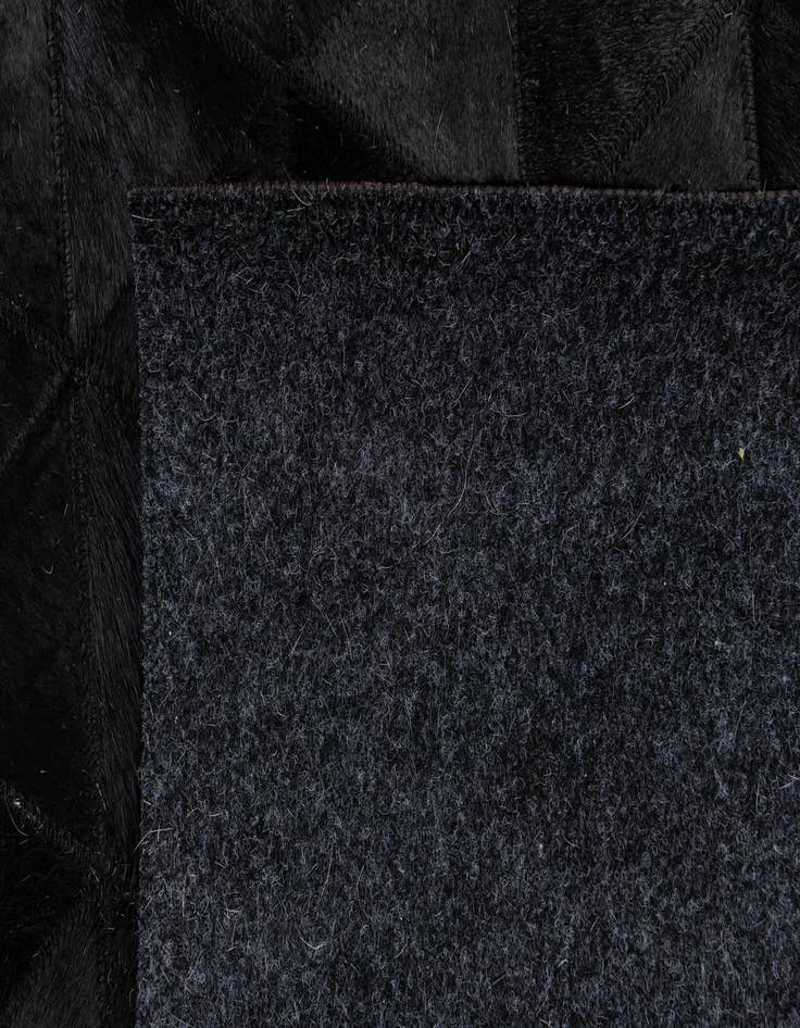 Detail image of 5' x 8' Cowhide Stocks Rug