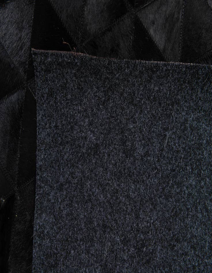 Detail image of 5' 1 x 8' Cowhide Stocks Rug