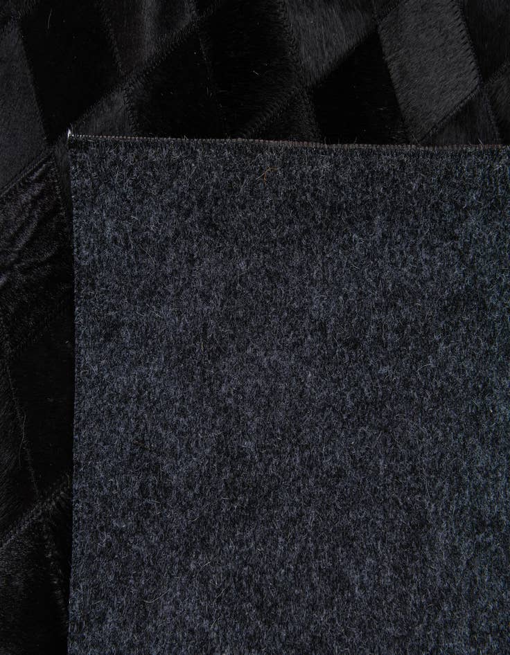 Detail image of 5' x 7' 10 Cowhide Stocks Rug