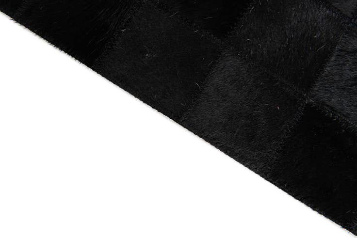 Detail image of 4' 11 x 7' 11 Cowhide Stocks Rug