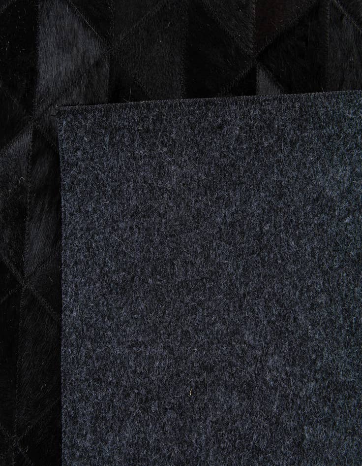 Detail image of 5' x 8' Cowhide Stocks Rug