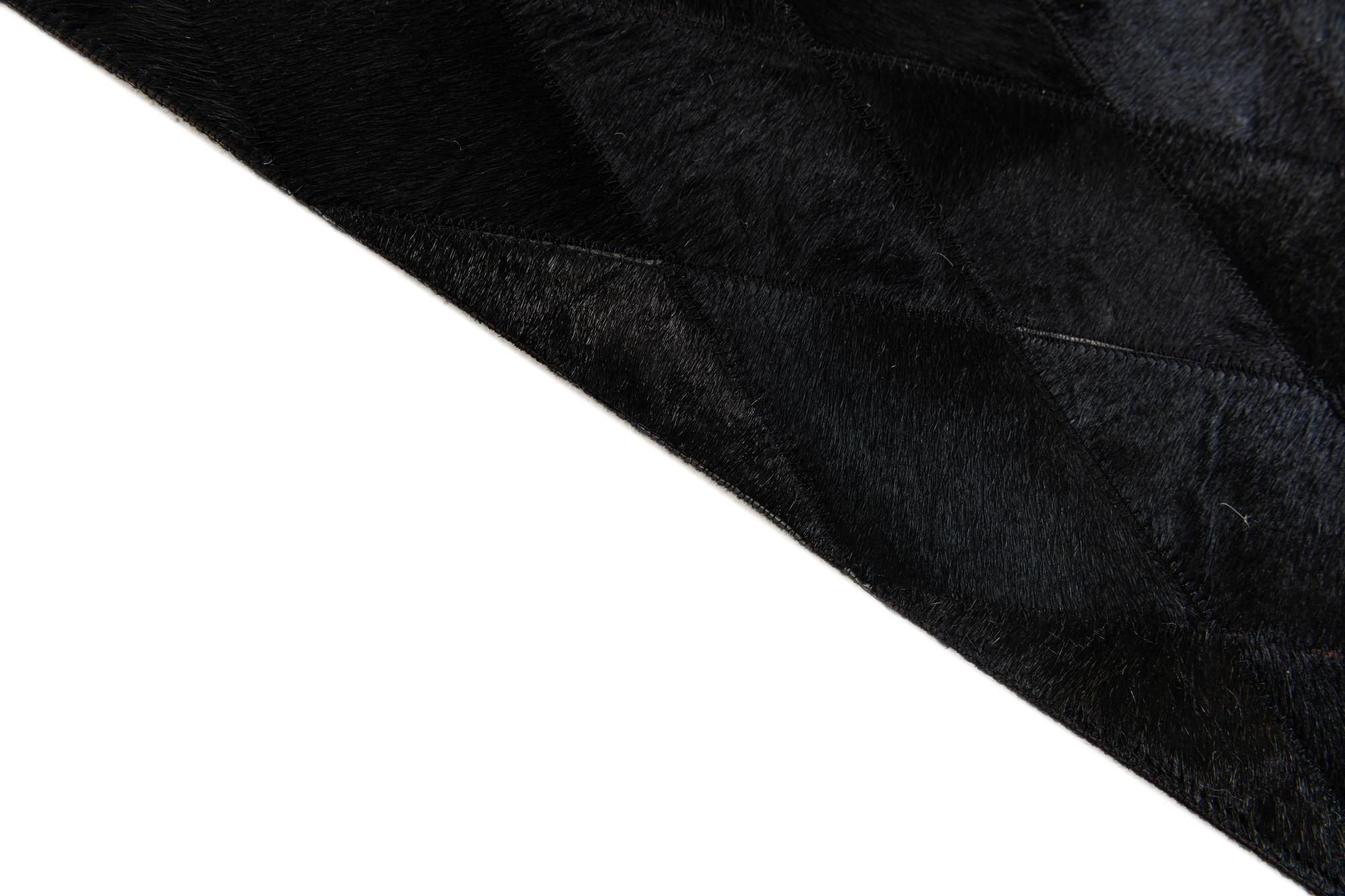 5' 7 x 7' 11 Cowhide Stocks Rug