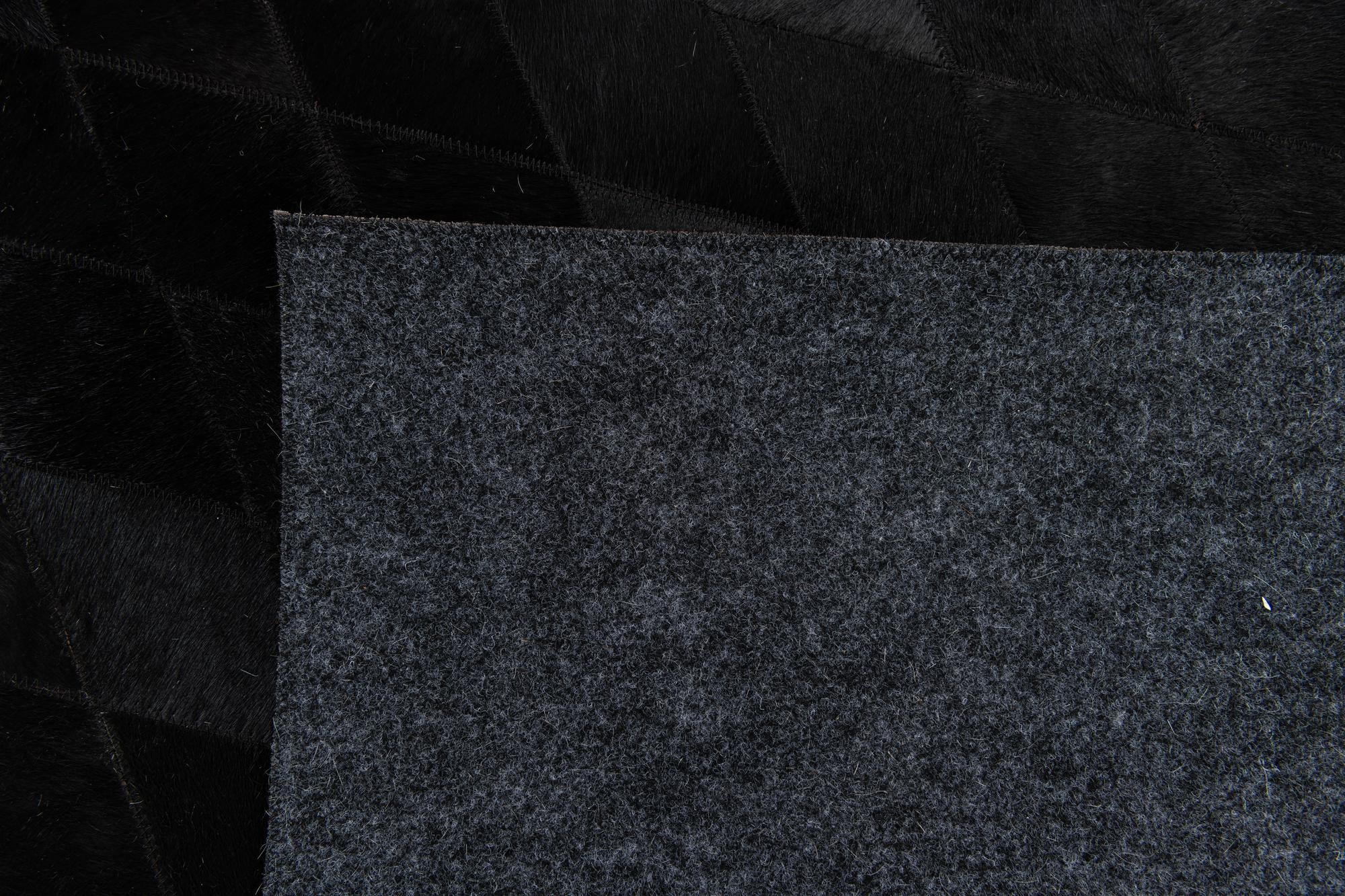 5' 7 x 7' 11 Cowhide Stocks Rug