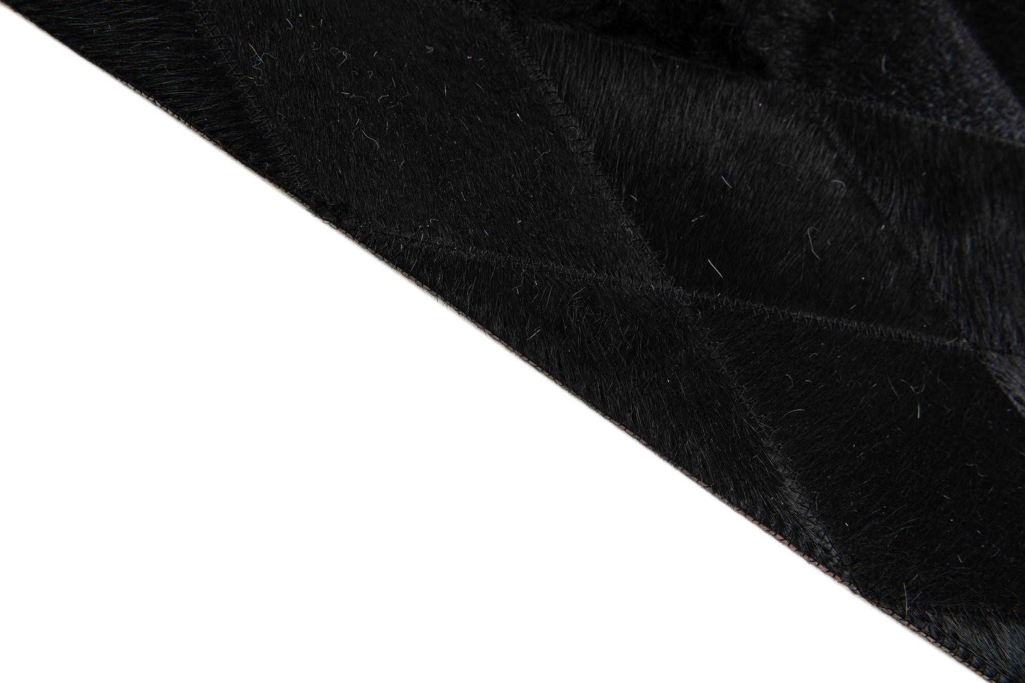 5' 7 x 7' 11 Cowhide Stocks Rug