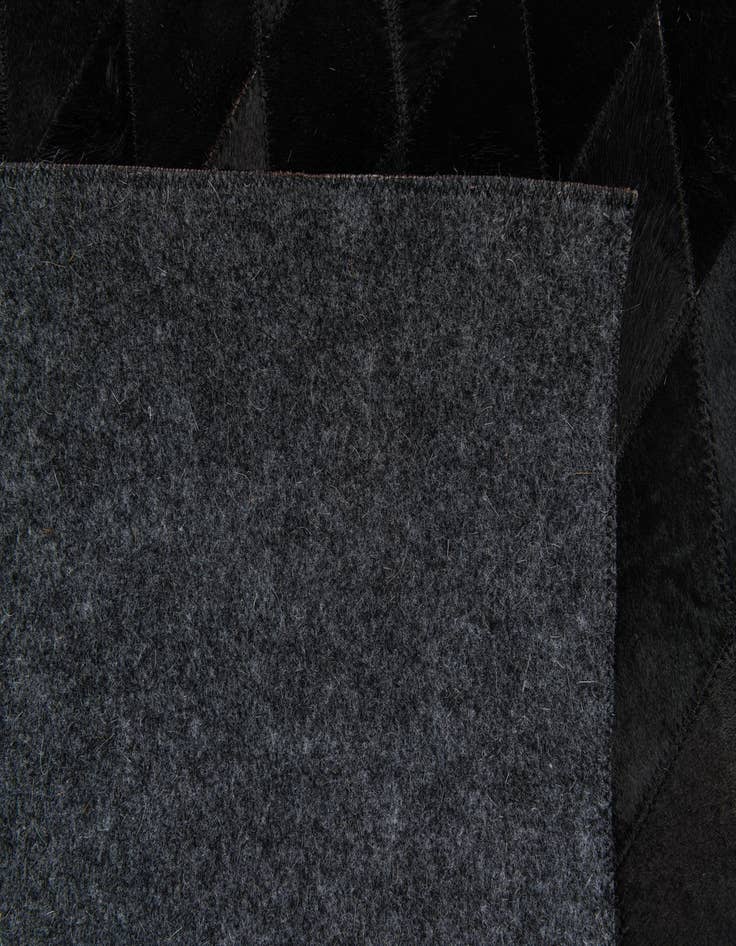 Detail image of 5' 2 x 8' Cowhide Stocks Rug