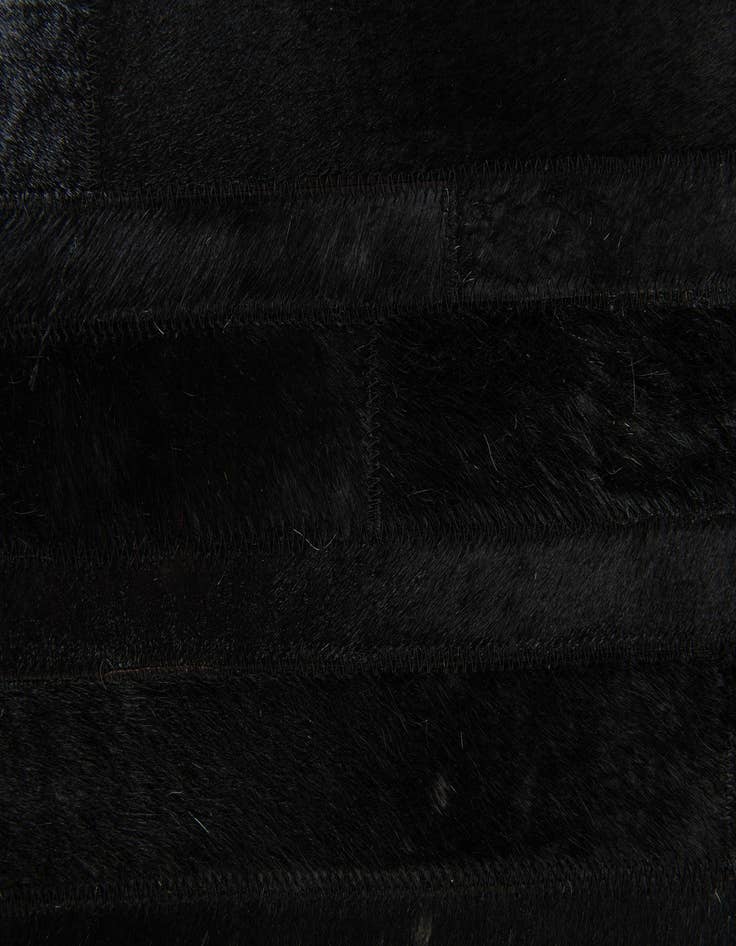 Detail image of 5' x 7' 11 Cowhide Stocks Rug