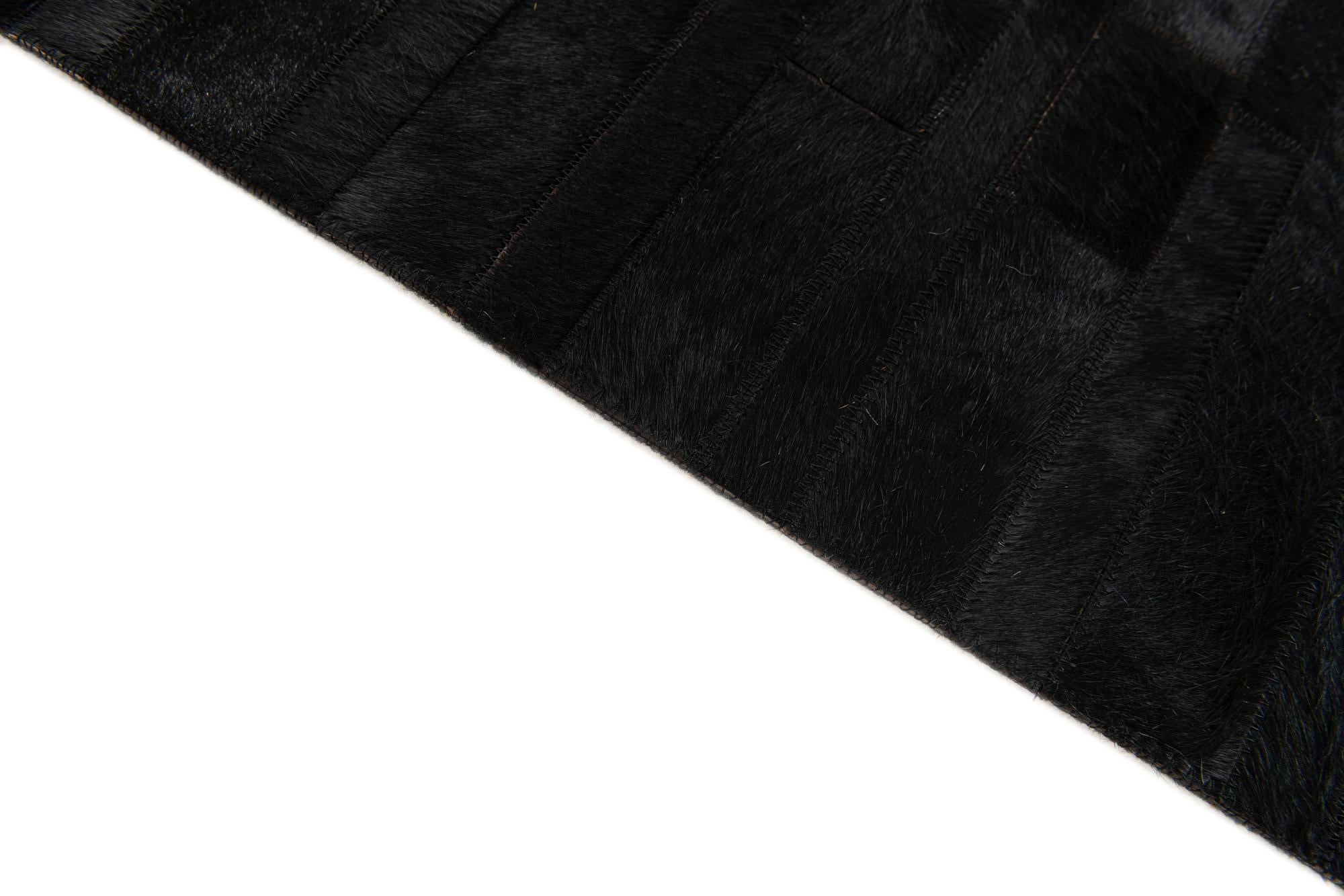 4' 11 x 7' 11 Cowhide Stocks Rug