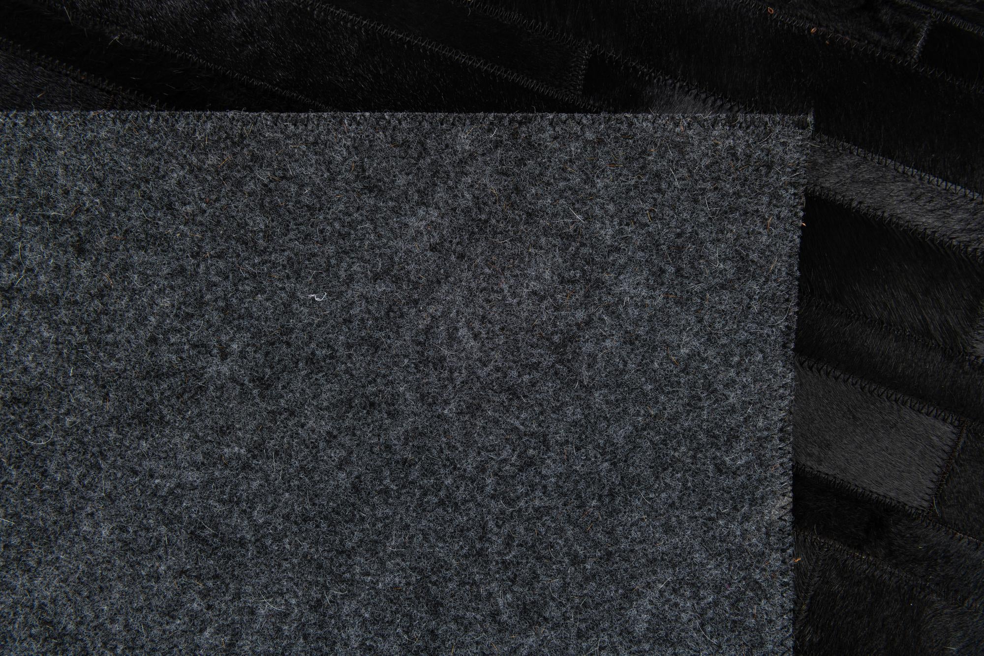 4' 11 x 7' 11 Cowhide Stocks Rug