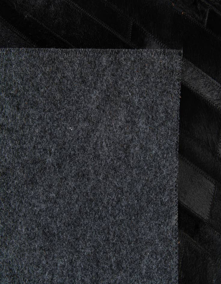 Detail image of 4' 11 x 7' 11 Cowhide Stocks Rug