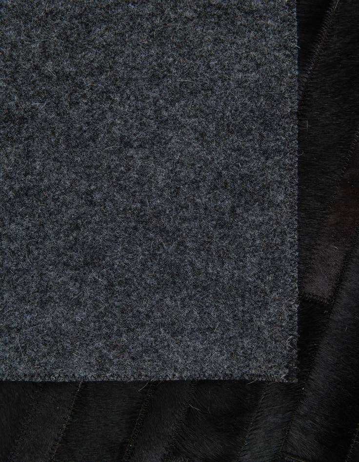 Detail image of 5' x 8' Cowhide Stocks Rug