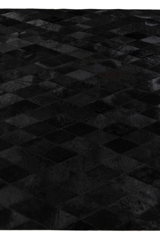 Detail image of 5' 1 x 8' Cowhide Stocks Rug