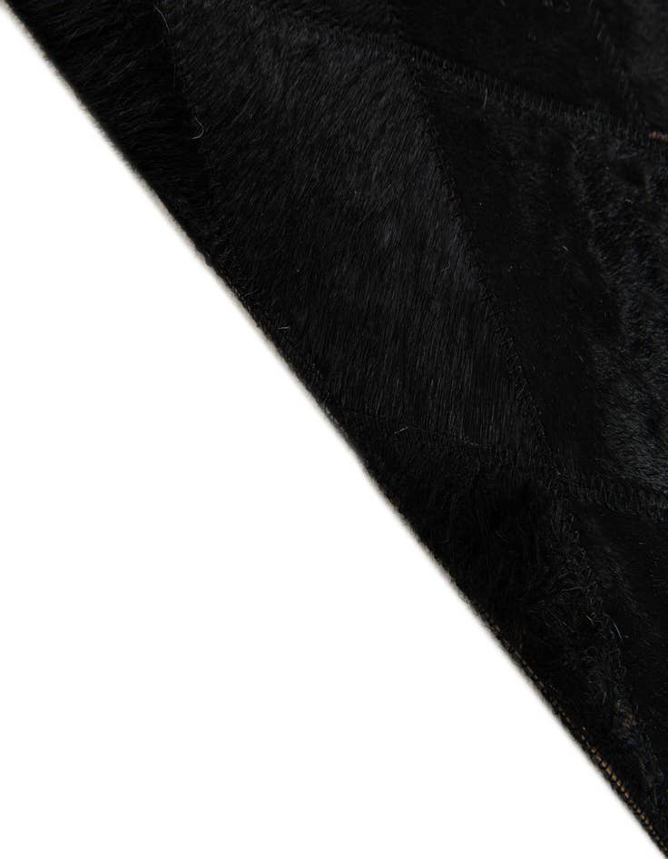 Detail image of 5' 1 x 8' Cowhide Stocks Rug