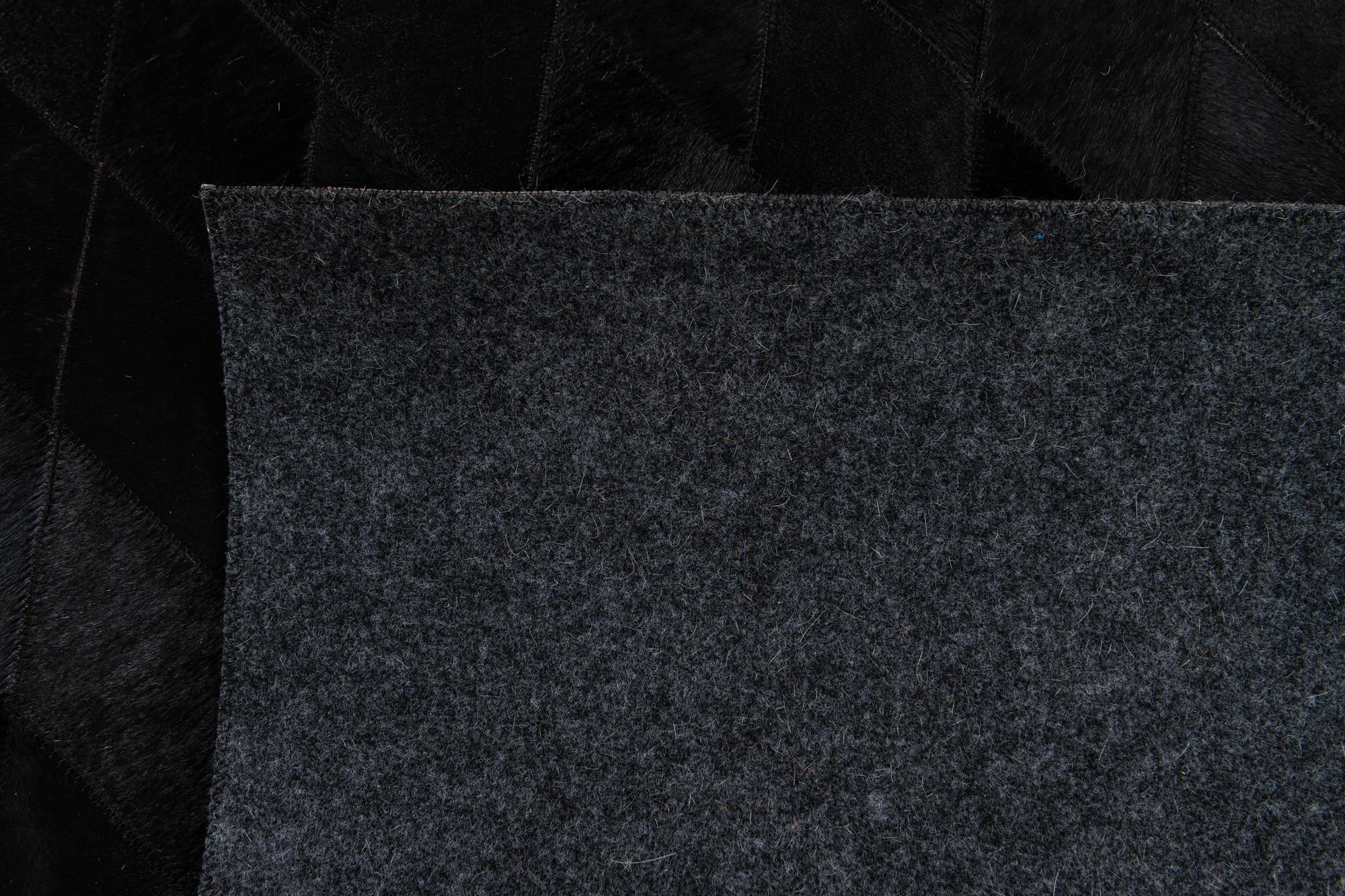 5' 1 x 8' Cowhide Stocks Rug