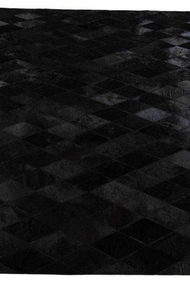 Detail image of 5' 1 x 8' Cowhide Stocks Rug